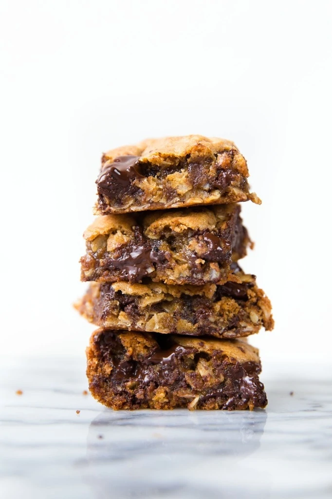 Whole Wheat oatmeal molasses dark chocolate gooey bars. A mouthful of healthy, low sugar, melt in your mouth flavor! | Broma Bakery