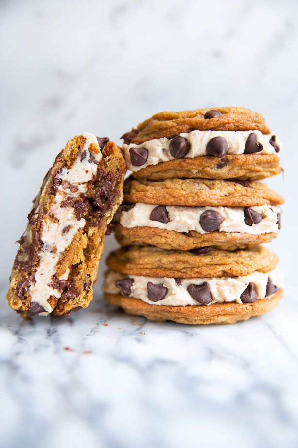 Chocolate chip cookie dough frosting sandwiched between giant chocolate chip cookies. Heaven. | via Broma Bakery | #chocolatechipcookies #cookiedough #cookiedoughfrosting