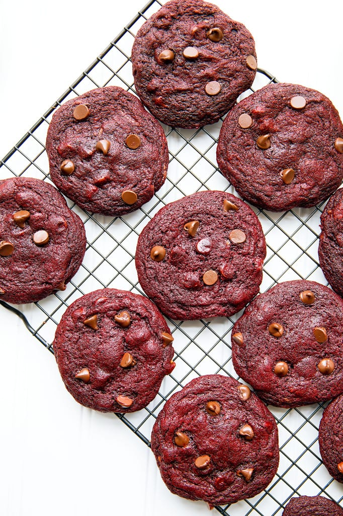 red velvet cookies on a wire cooling rack