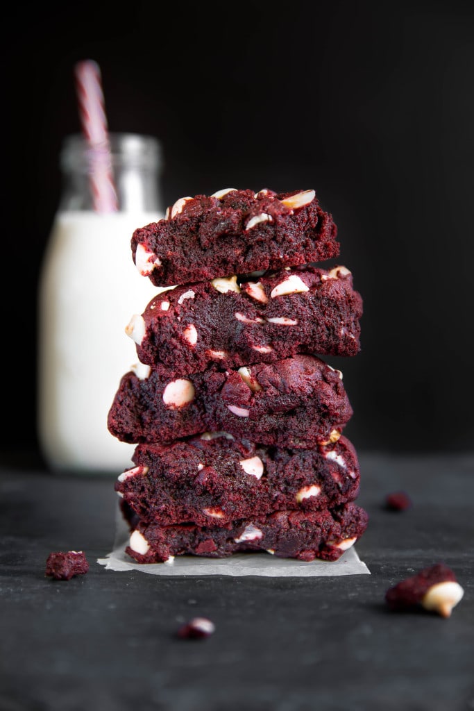 Red Velvet Brookies in a stack with milk