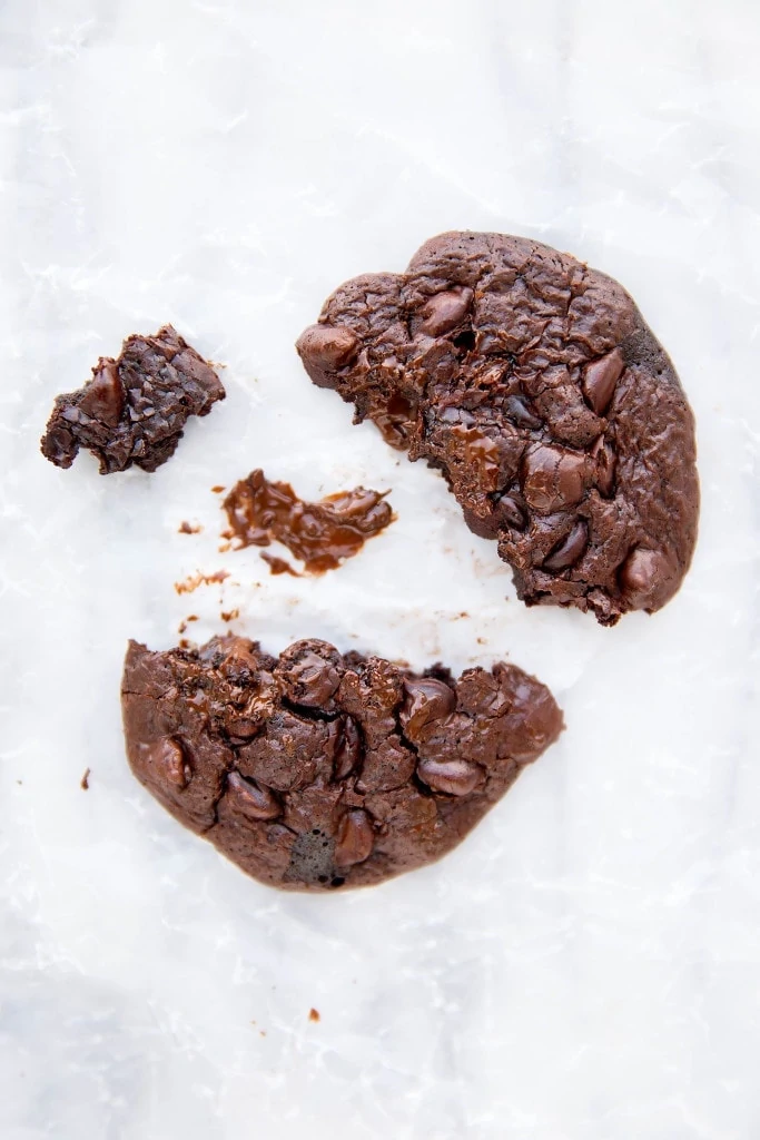Flourless chocolate cookie broken in half
