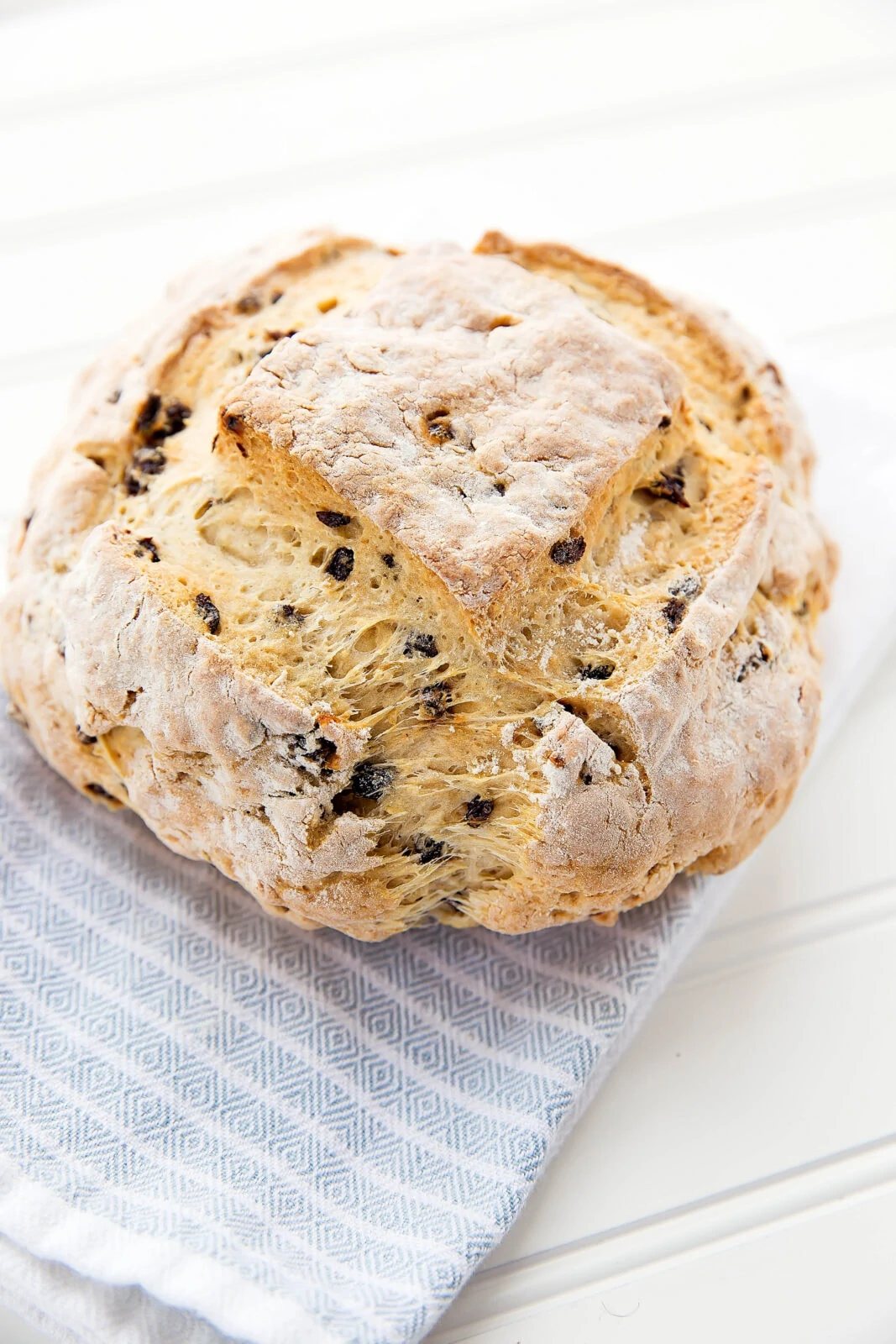Homemade Irish Soda Bread in one hour? It's almost too good to be true! Celebrate St. Patrick's day with this quick, easy, and delicious loaf