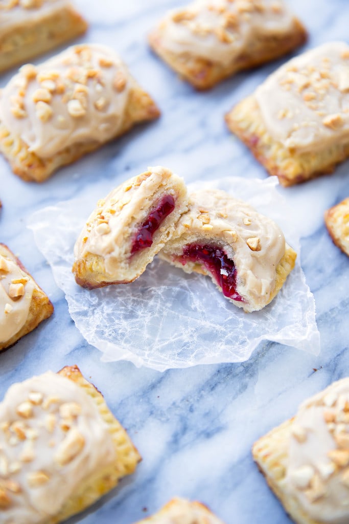 In honor of National Pi Day, these Mini Peanut Butter Jelly Pop Tarts combine flakey pastry strudel, a jelly center, and peanut butter icing in this bite sized treat that everyone will love!