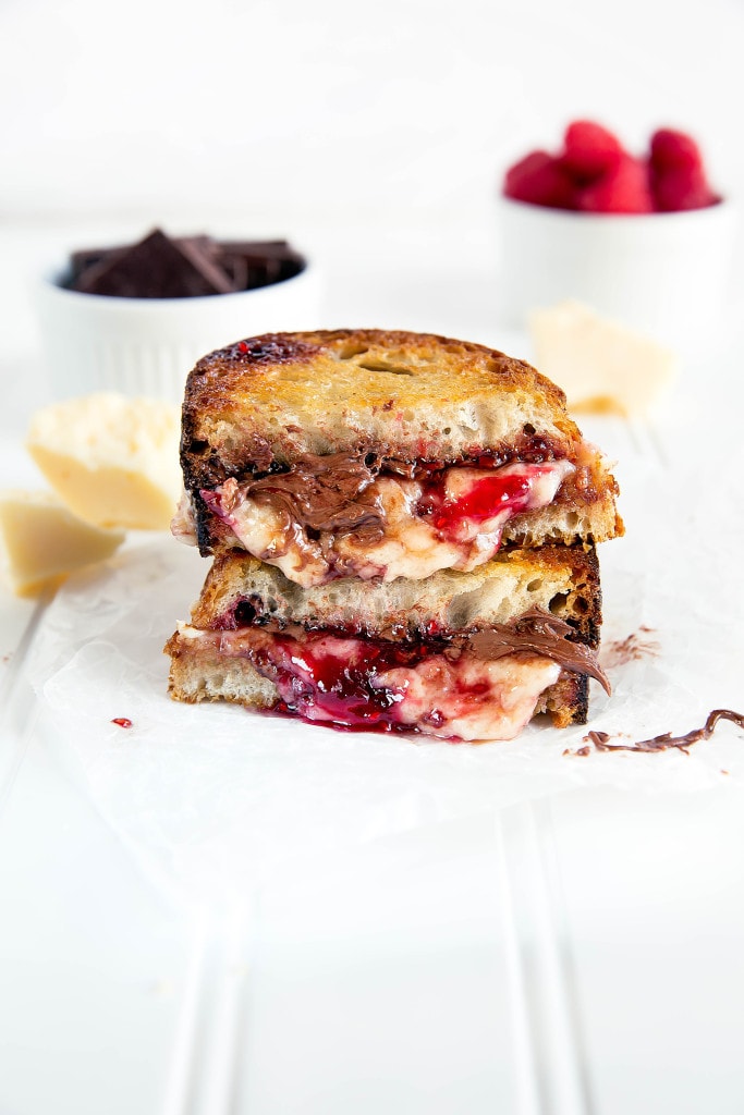 Nutty Havarti cheese is paired with Nutella and raspberry jam to make the tastiest grilled cheese I've ever had!