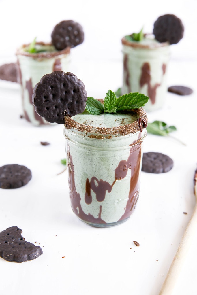 A Thin Mint Milkshake made with fresh mint, Thin Mint cookies, and vanilla ice cream. Perfect for St. Patty's Day!