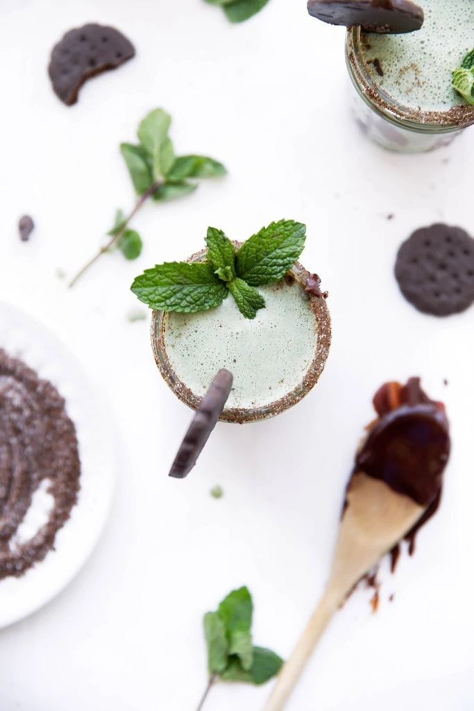 A Thin Mint Milkshake made with fresh mint, Thin Mint cookies, and vanilla ice cream. Perfect for St. Patty's Day!