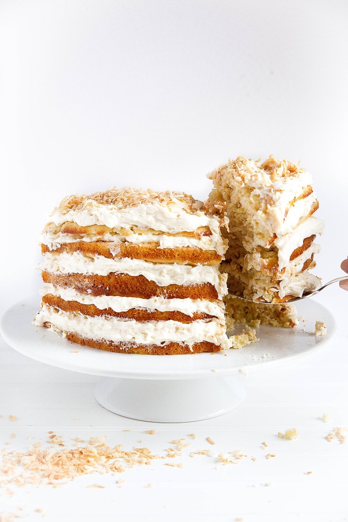 We're taking pina coladas to the next level with this five layer pineapple and coconut Pina Colada Cake. It just screams summer! 