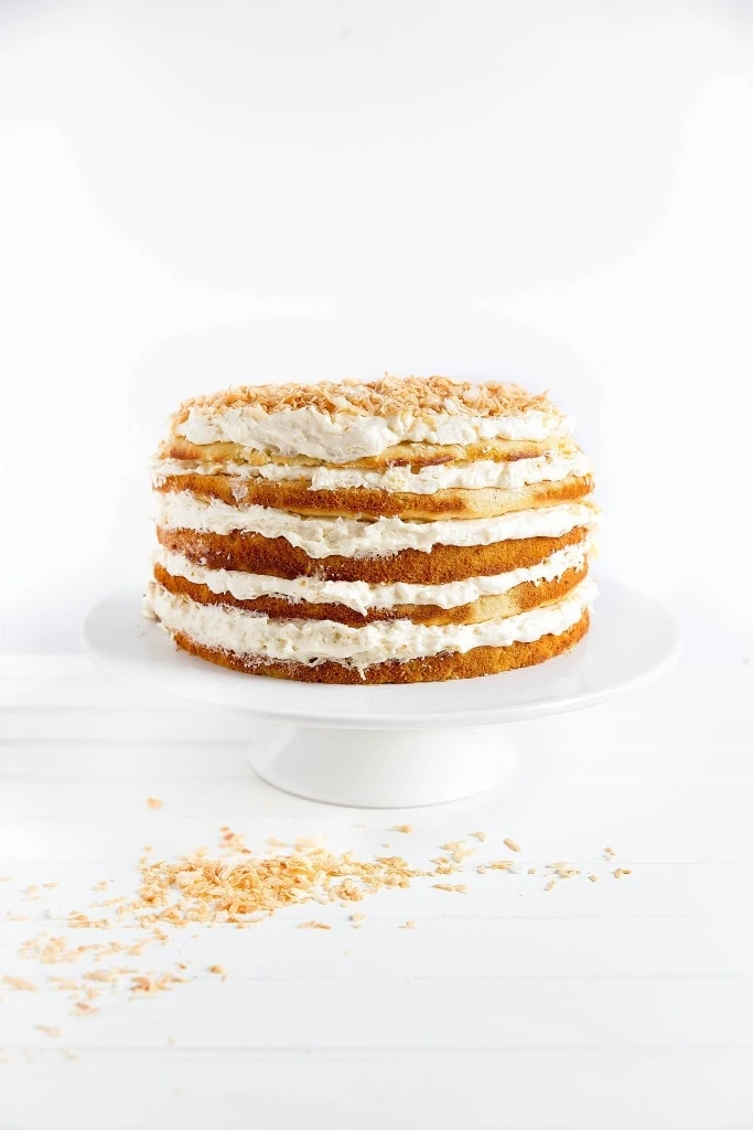 We're taking pina coladas to the next level with this five layer pineapple and coconut Pina Colada Cake. It just screams summer! 