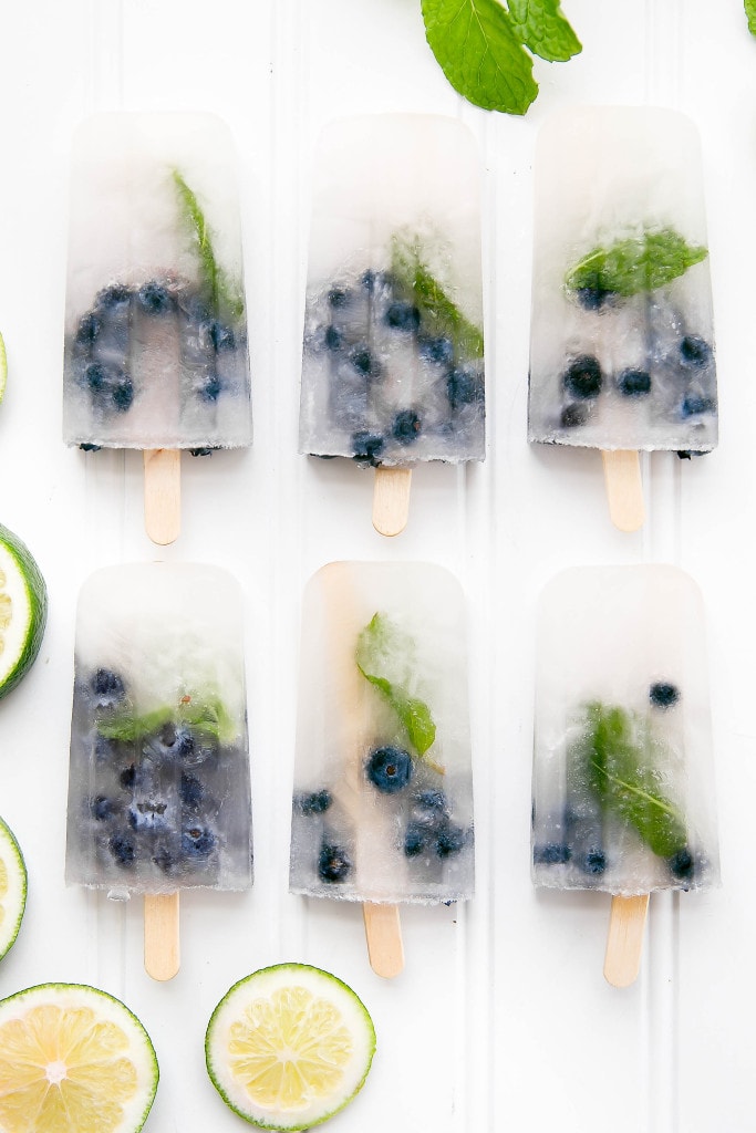 Get your booze on with these thirst-quenching Blueberry Mojito Popsicles!