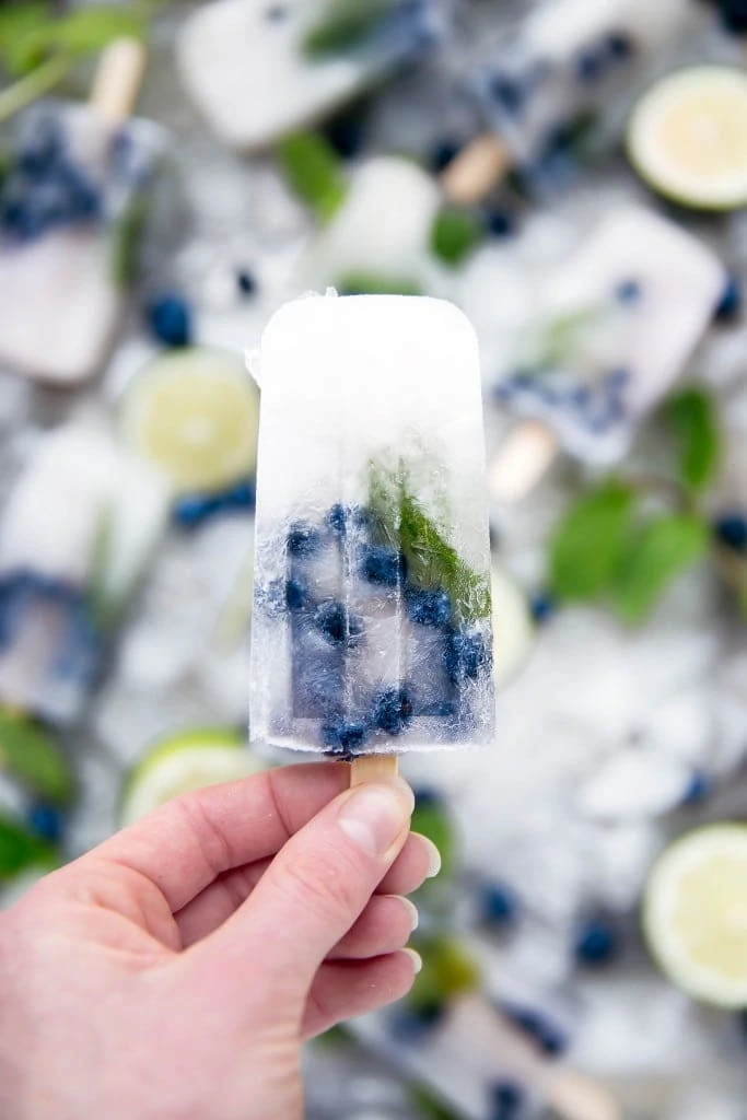 Get your booze on with these thirst-quenching Blueberry Mojito Popsicles!