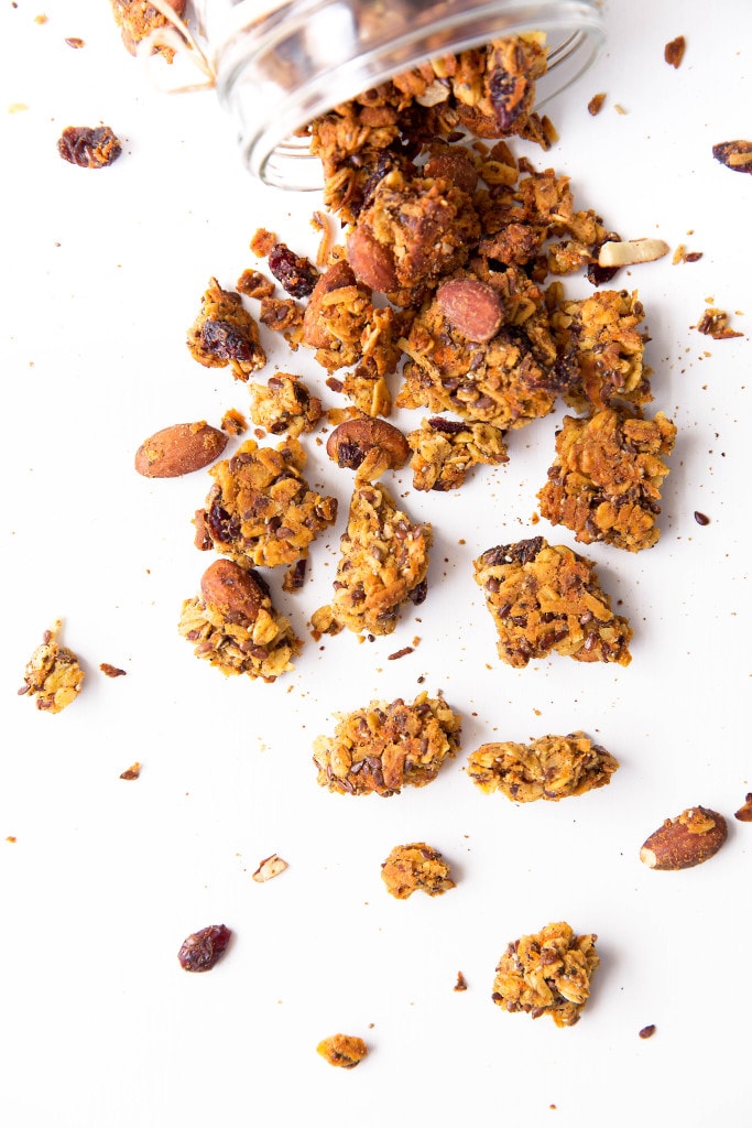 Packed with carrots, coconut, cinnamon, and raisins, this Carrot Cake Granola takes breakfast up a notch. Gluten free, refined sugar free, and loaded with ingredients that will keep you full all morning long.