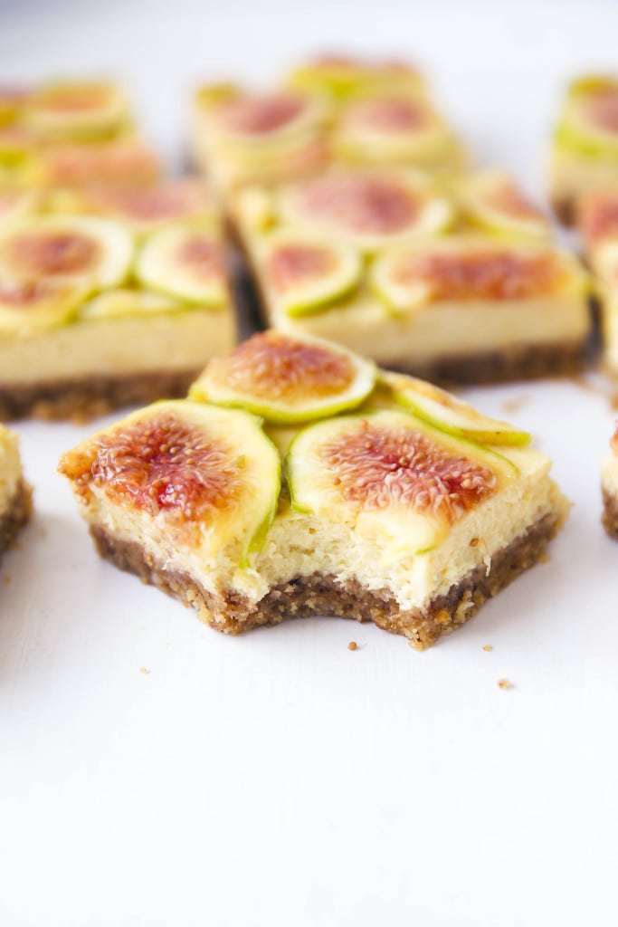 Honey Walnut Fig Cheesecake Bars: velvety honey cheesecake with a graham cracker walnut crust and a mosaic of fresh figs.