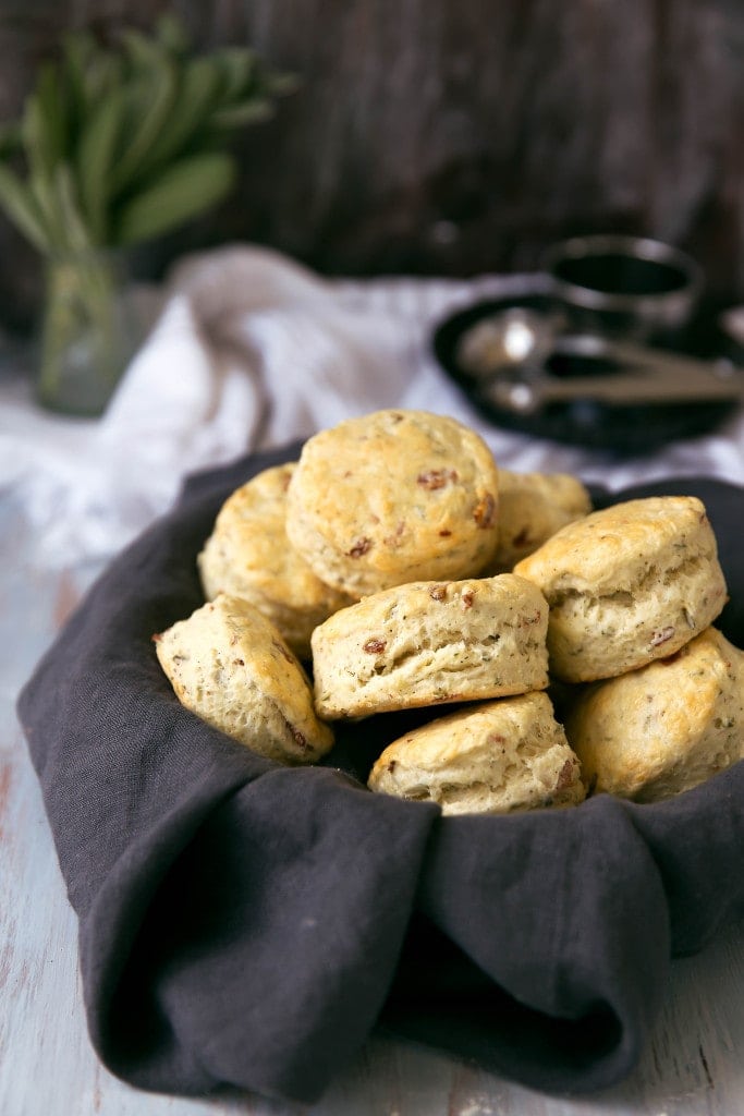 Creamy, flakey buttermilk biscuits speckled with fresh sage and bacon. A winning combination worthy of any table.