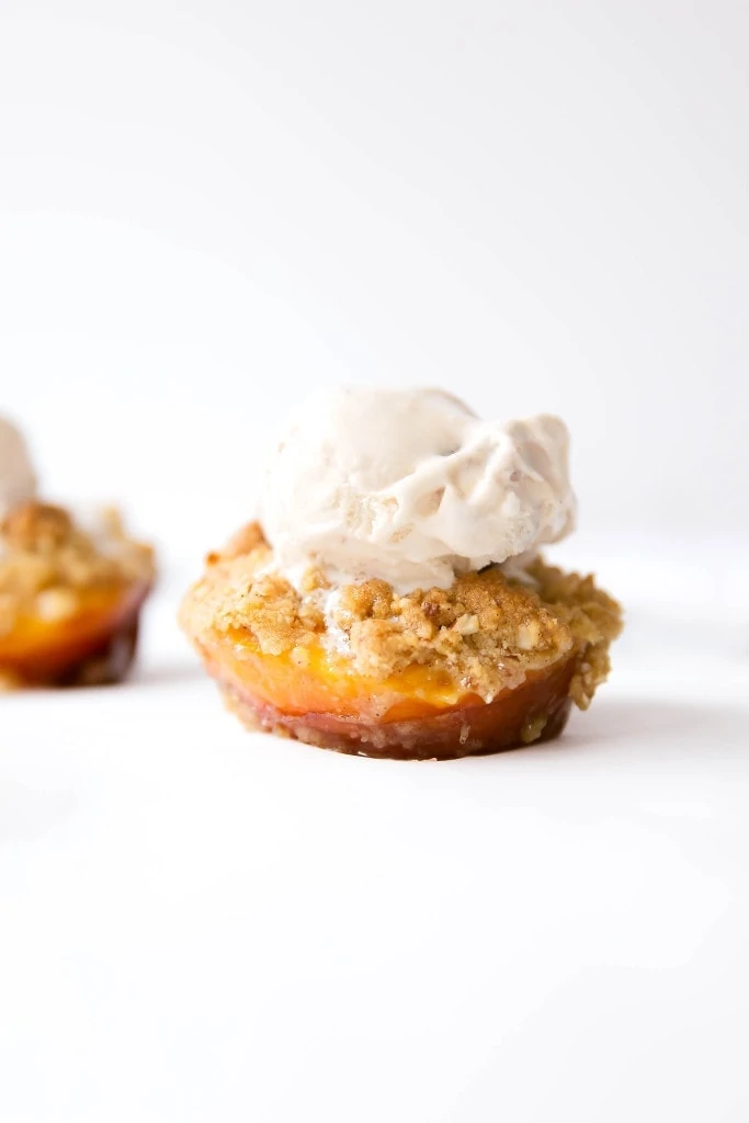 Perfectly roasted peaches with an addicting oatmeal almond crumble