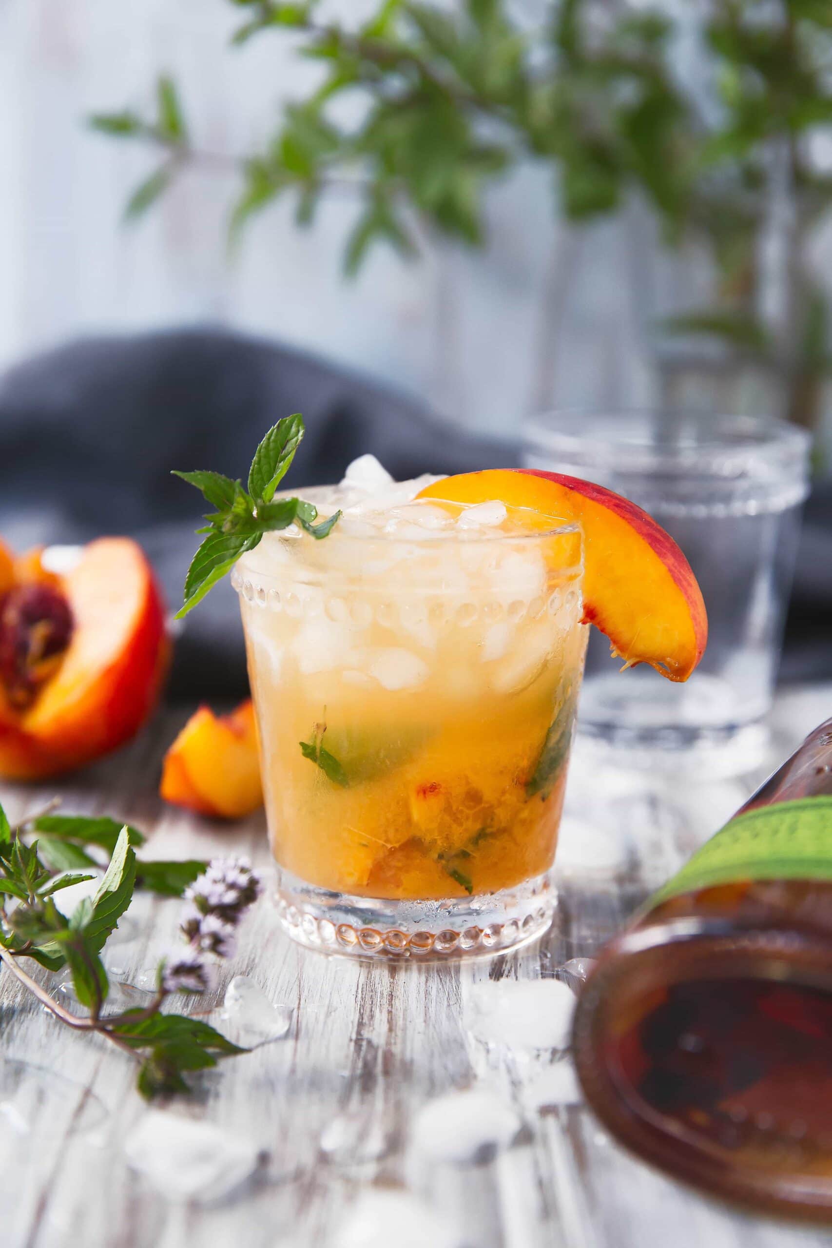 The classic mint julep gets a twist with this mouth-watering Peach Julep!