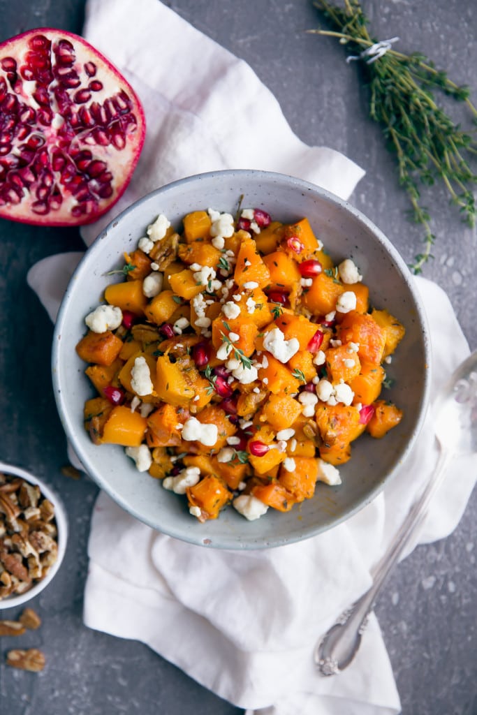 Roasted Butternut Squash with Gorgonzola, Pecans, and Pomegranate in a bowl
