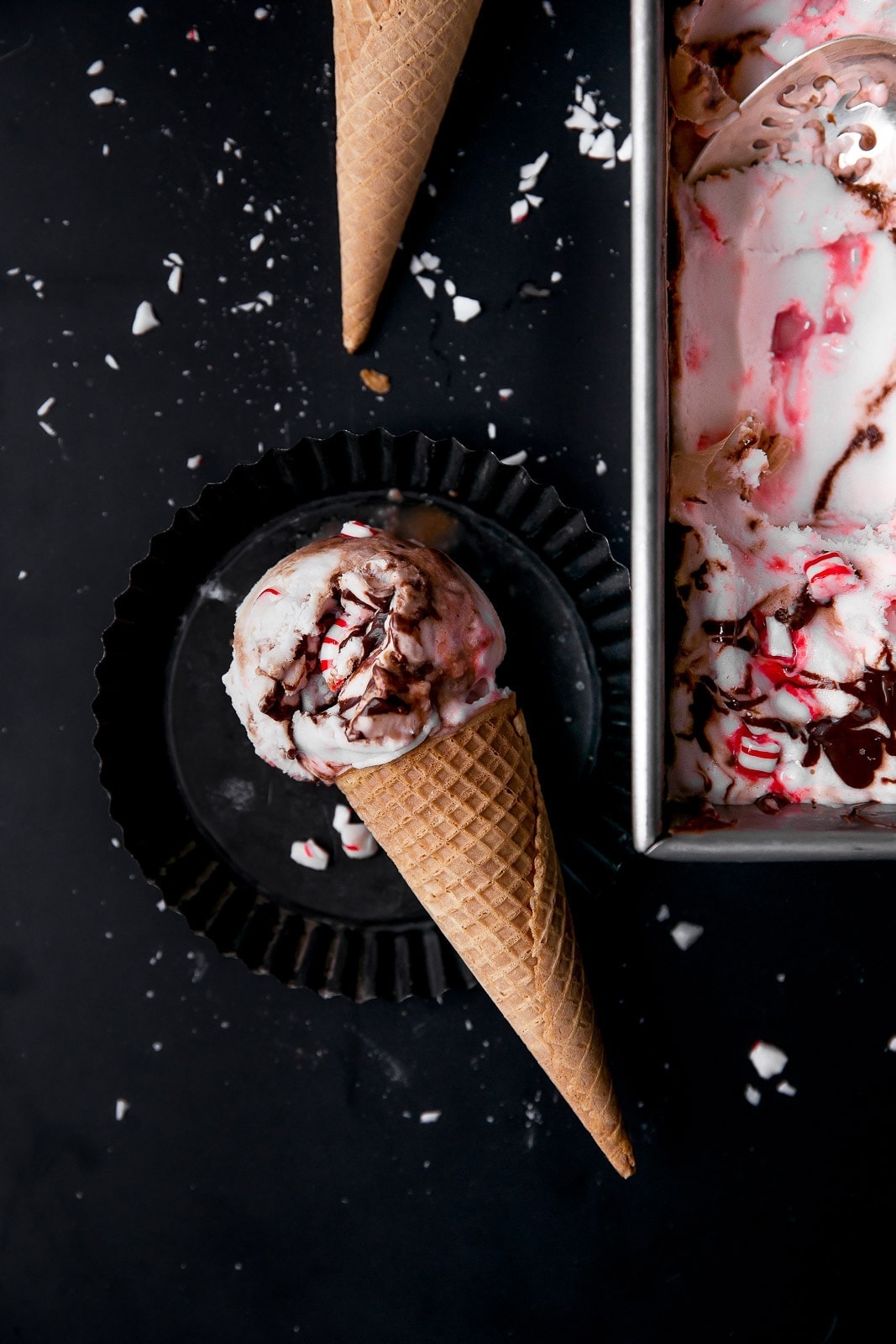 Creamy Peppermint Fudge Ripple Ice Cream with all of the flavor and none of the dairy! Vegan, gluten-free, and totally delicious.