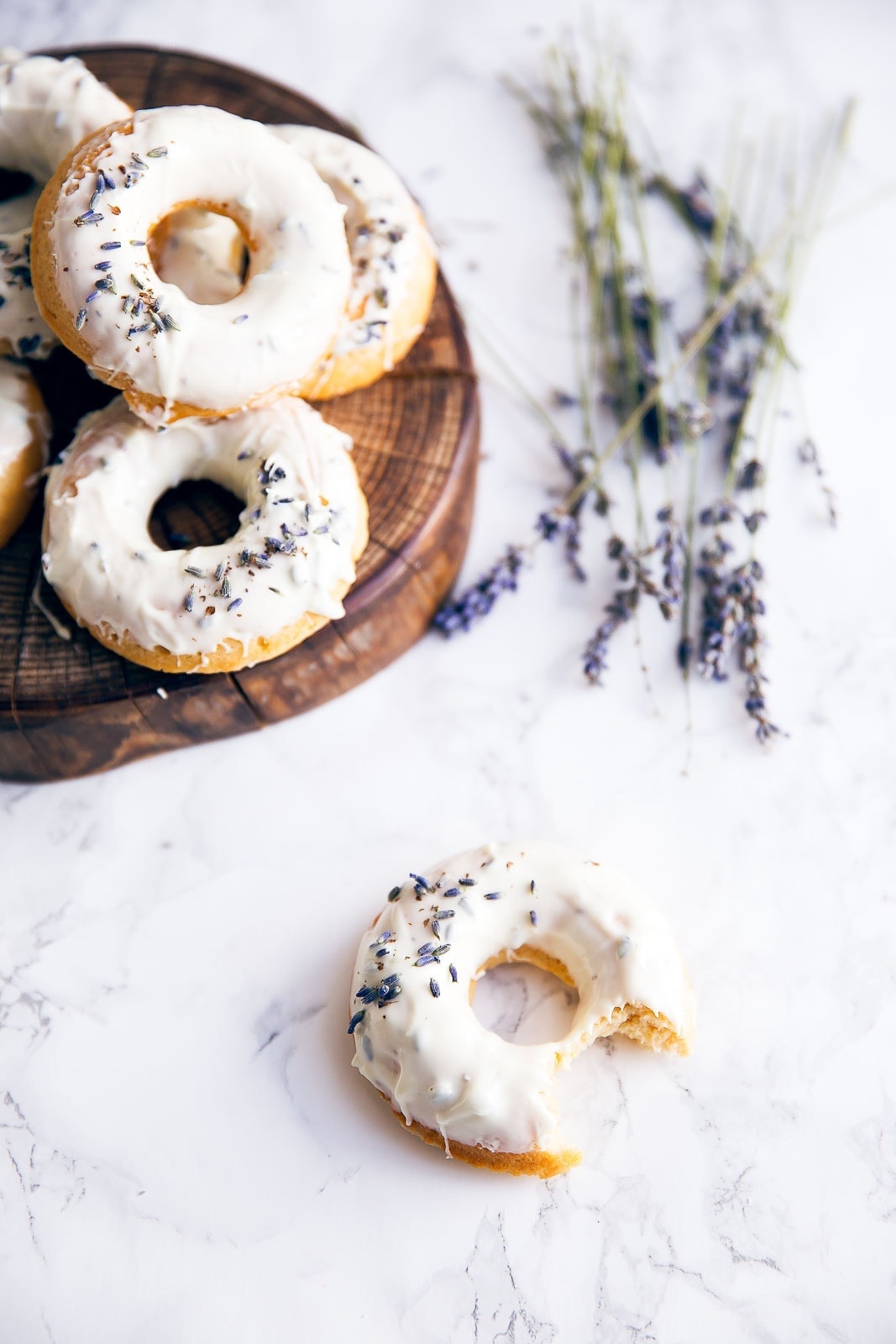 Celebrate spring with baked lemon donuts dipped in a lavender-infused white chocolate ganache!