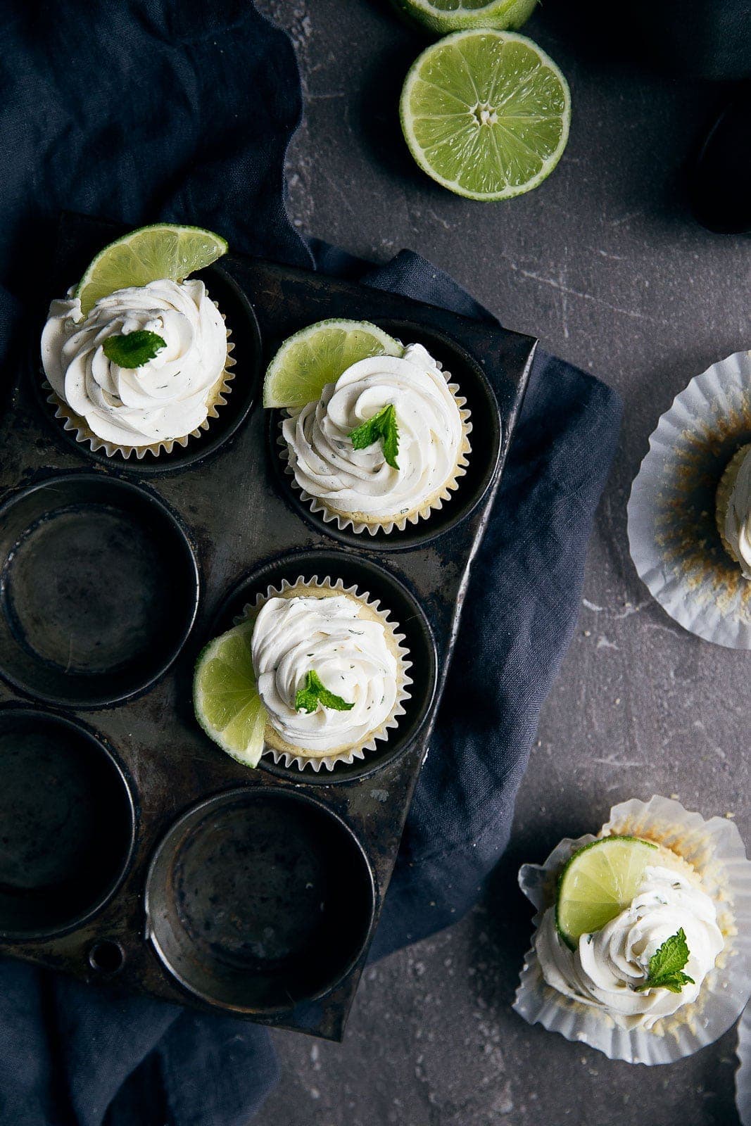 Boozy Mojito Cupcakes: an infusion of lime, mint, and rum, all in one little cupcake!