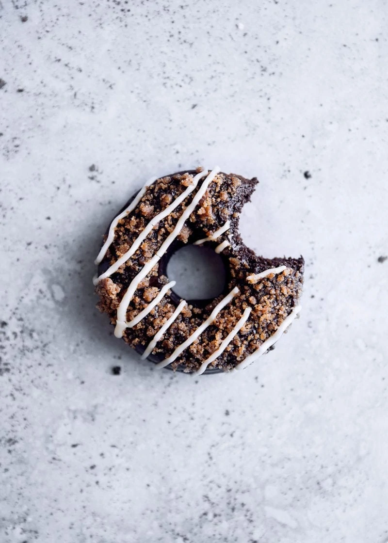 Mocha donuts with chocolate ganache, mocha toffee crunch, and coffee glaze. These babies are just begging to be dipped in your morning coffee.