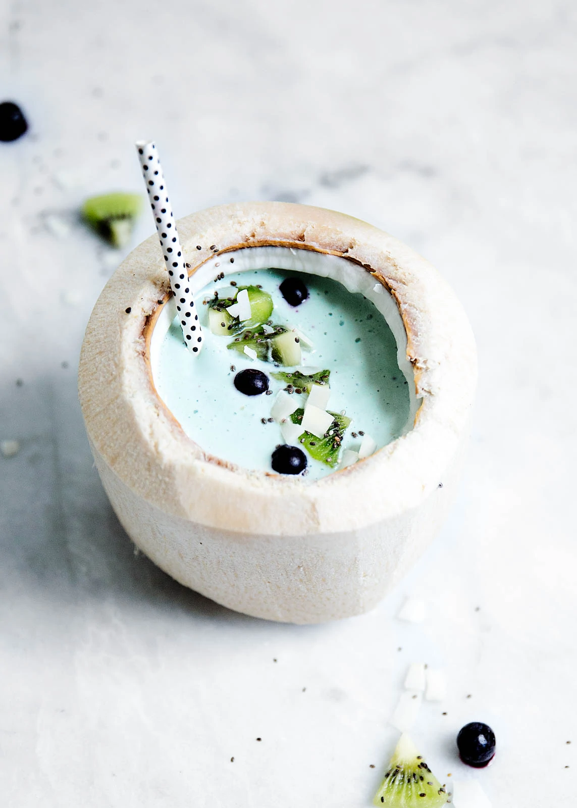 A blue algae smoothie filled with detoxifying spirulina, chia seeds, and blueberries. Hello, summer bod.