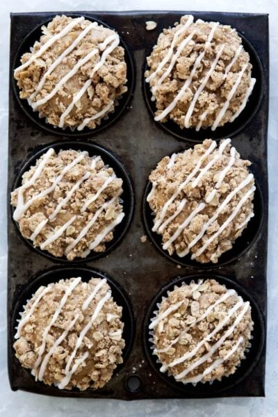 Moist apple muffins topped with a crunchy apple crisp topping. Like, omg.