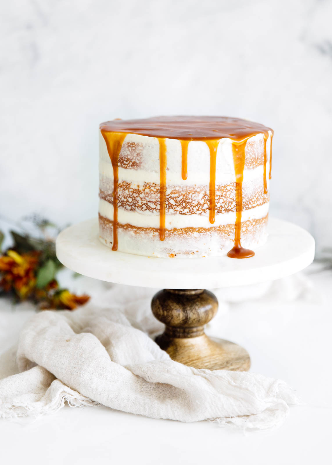 spiced carrot cake on a cake stand