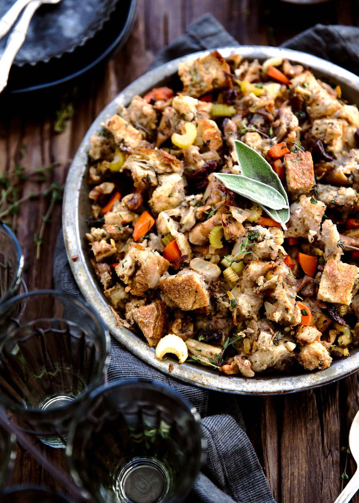 The best part of Thanksgiving is stuffing. So why not make the ultimate Thanksgiving stuffing with sourdough, dark meat chicken, dried cherries, walnuts, and loads of herbs?
