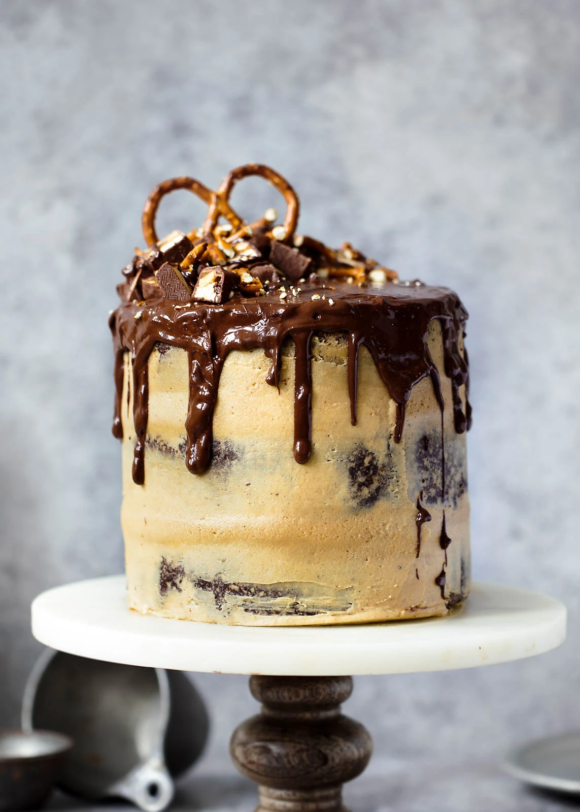Peanut Butter Chocolate Stout Cake on cake stand