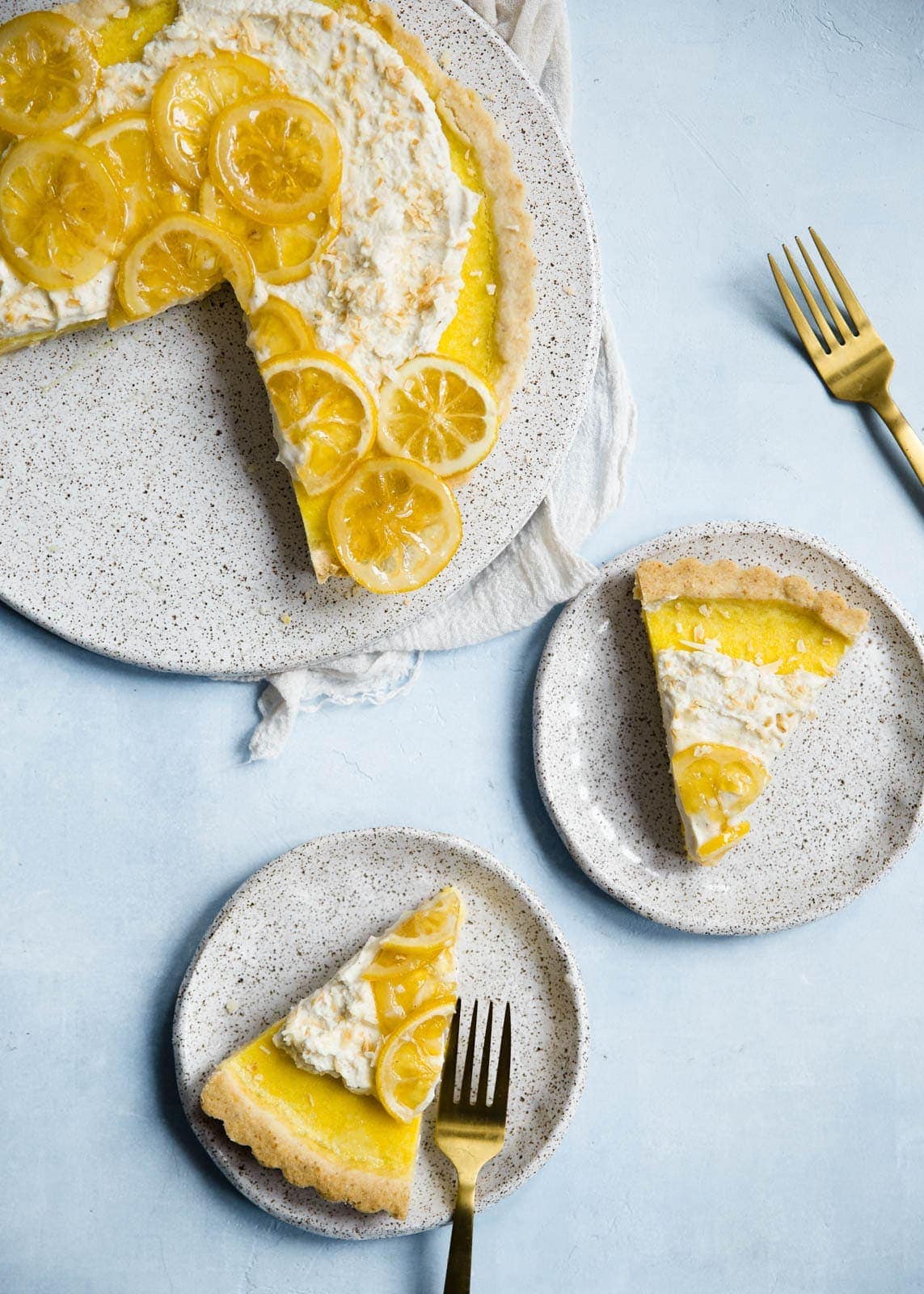Lemon Coconut Tart with whipped vanilla bean crème fraîche and candied lemons