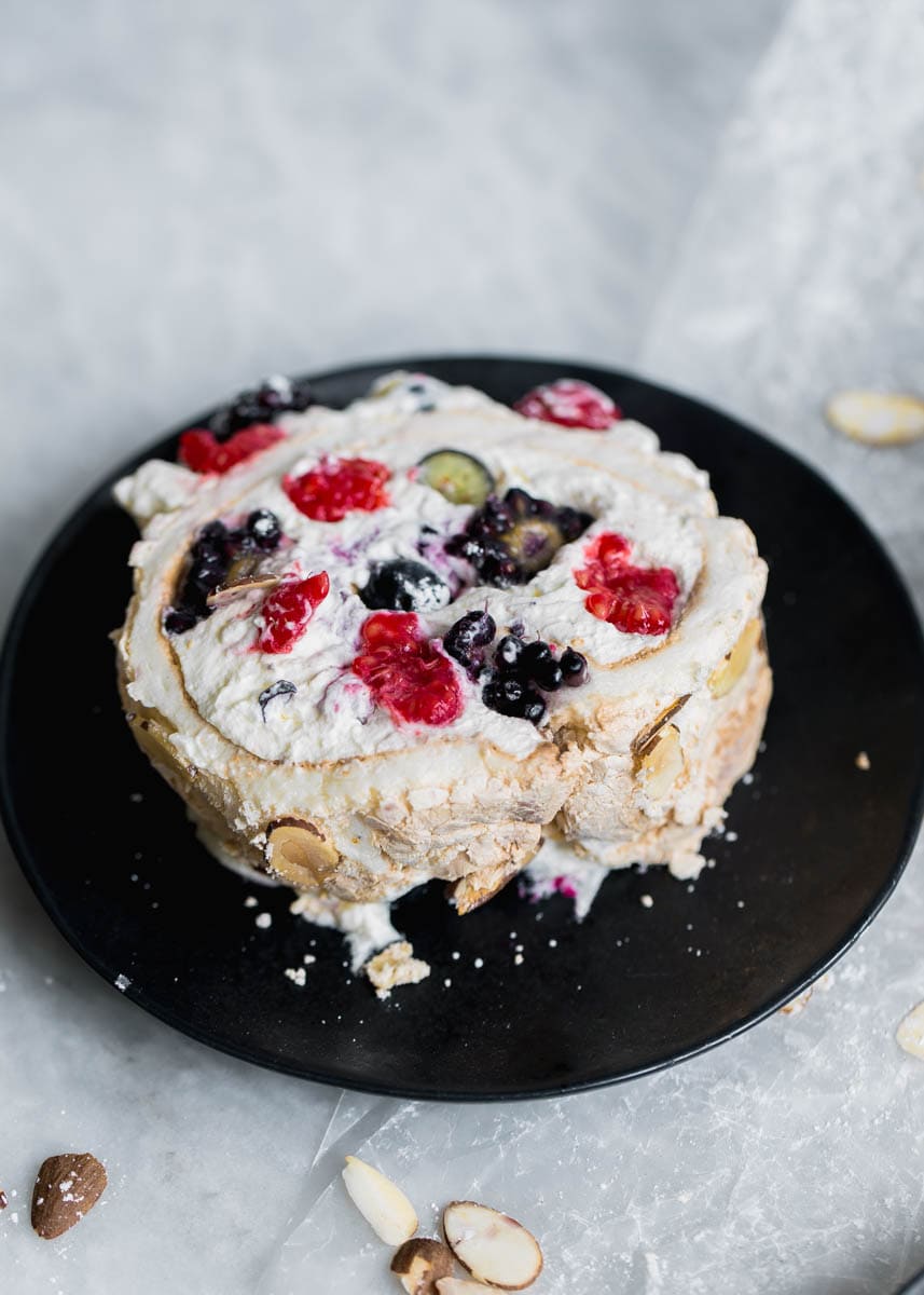 A Triple Berry Meringue Roulade perfect for summer nights. Easy to make and a total crowd-pleaser!