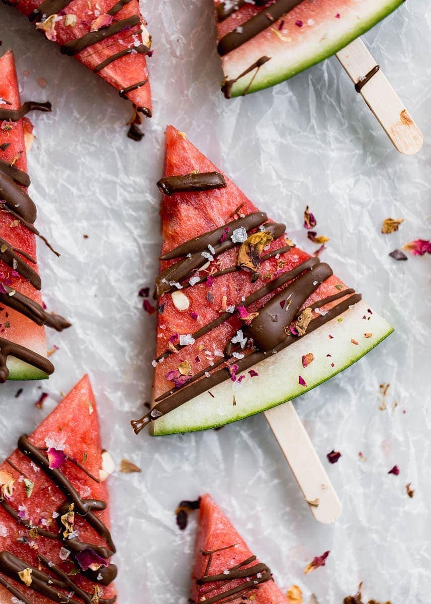 Low in sugar and totally refreshing, these fresh watermelon popsicles drizzled with chocolate and sea salt are the perfect treat on a hot summer's day!