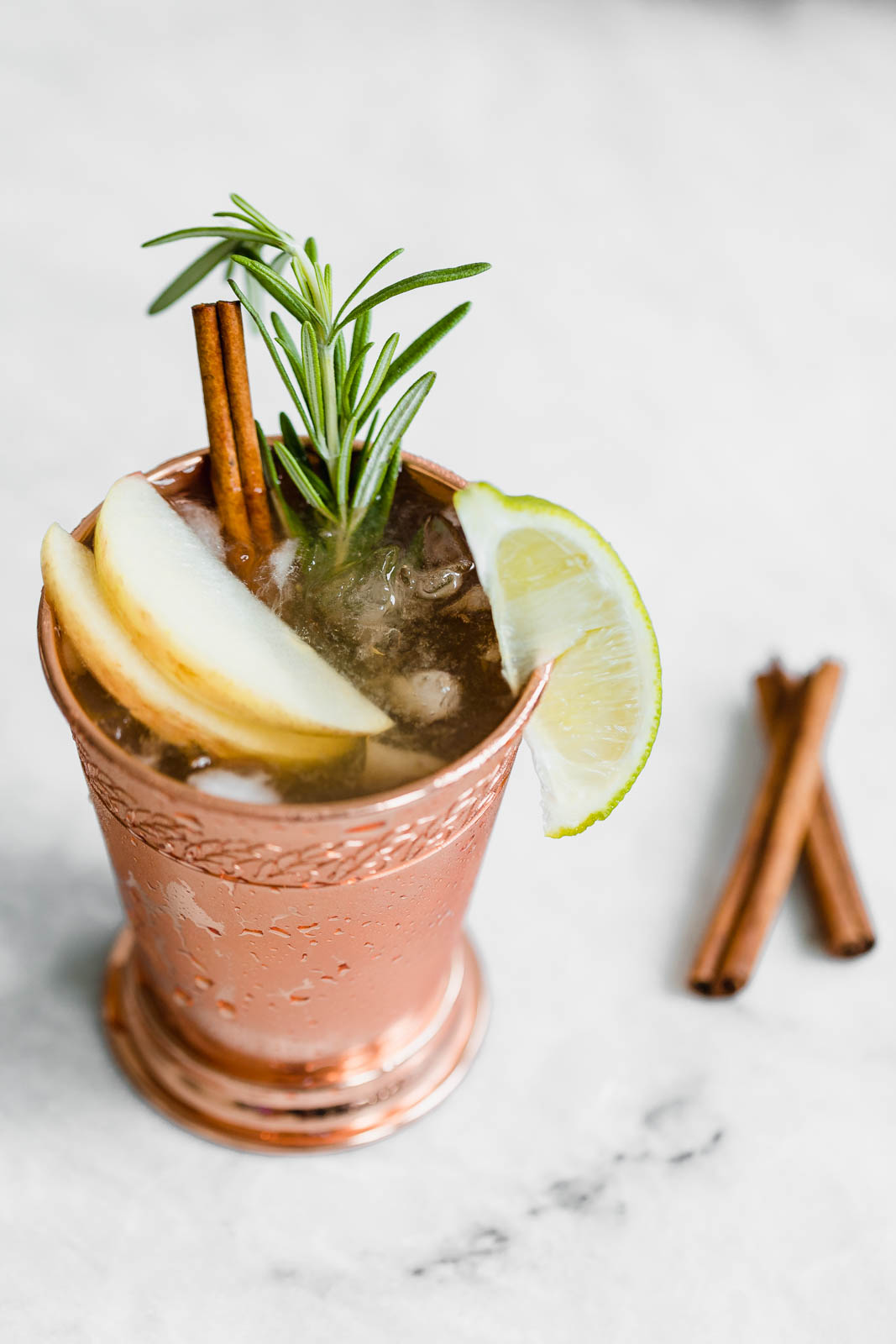 apple cider moscow mule with lime wedge 