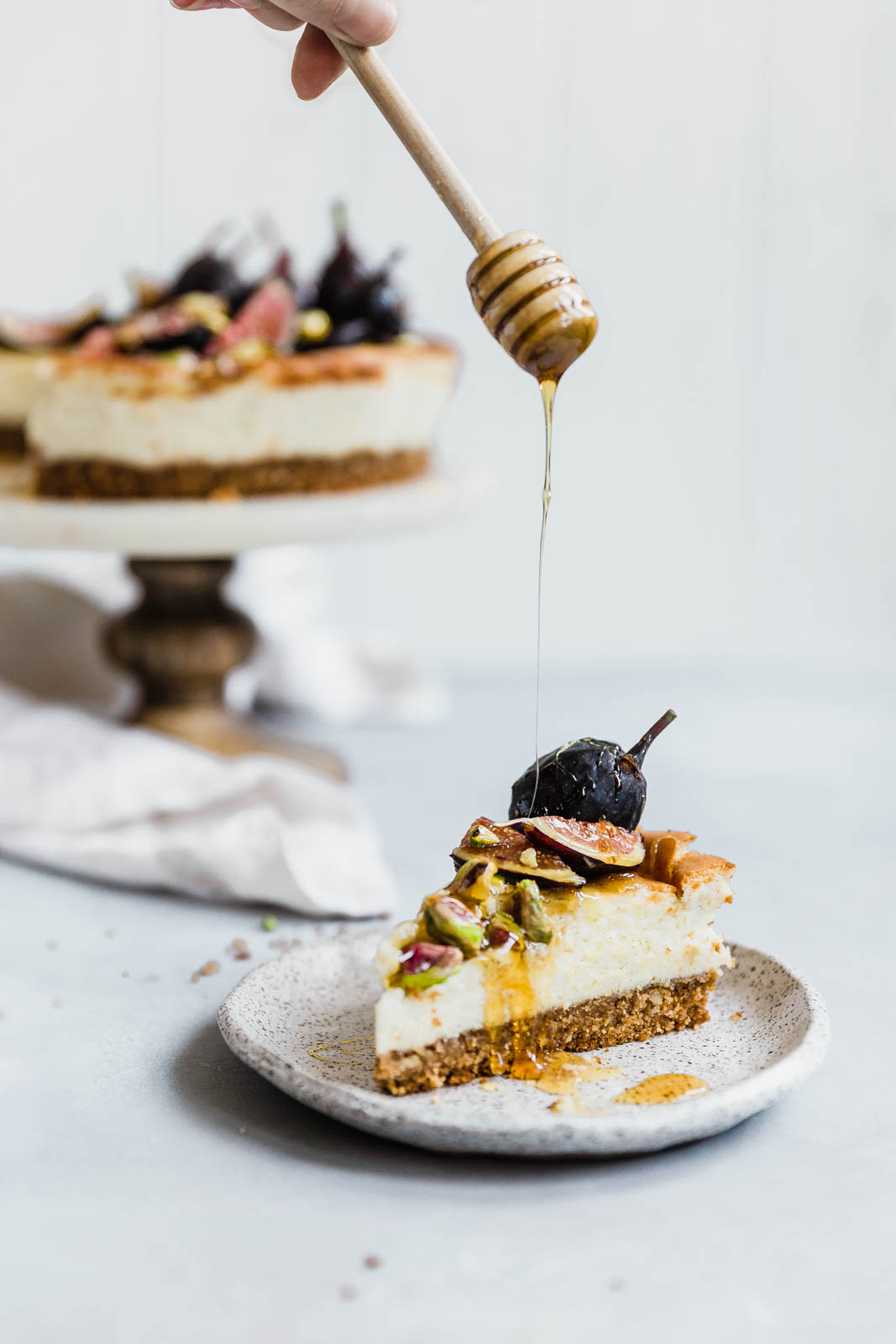 slice of Vanilla bean cheesecake with honey and figs
