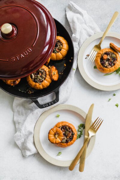 Mini wild rice stuffed pumpkins chock full of fall vegetables, pecans, and cranberries. The result: a completely edible stuffed pumpkin bursting with flavor