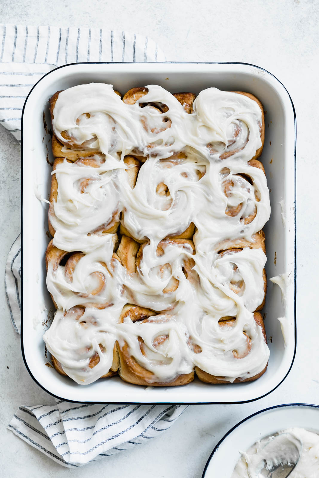  maple cinnamon sticky buns in a baking pan