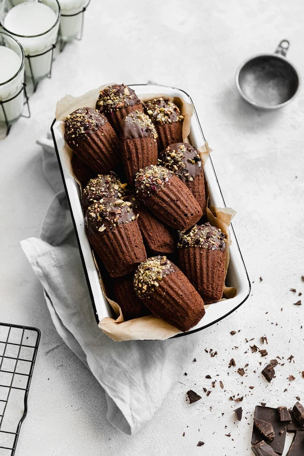 Simple and elegant, these chocolate dipped Chocolate Madeleines are almost too pretty to eat! But only almost, because they're also too good NOT to eat :)