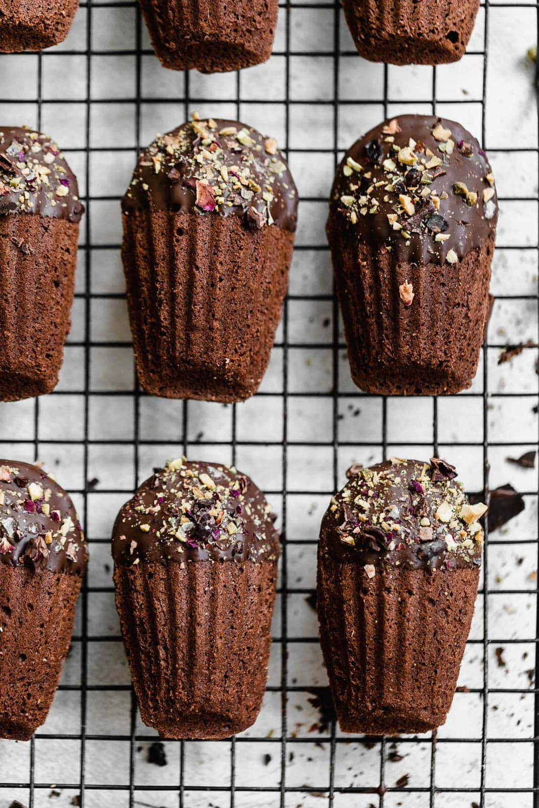 Chocolate-Dipped Chocolate Madeleines on wire rack