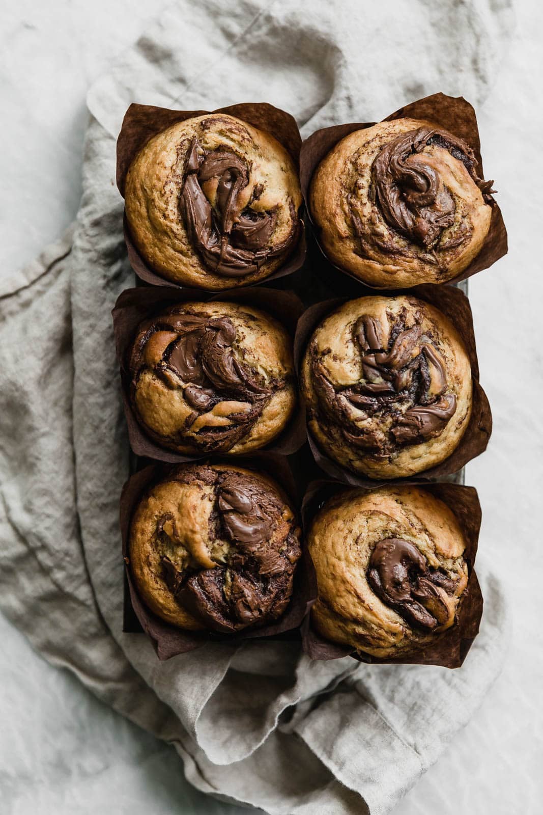banana nutella muffins in paper liners
