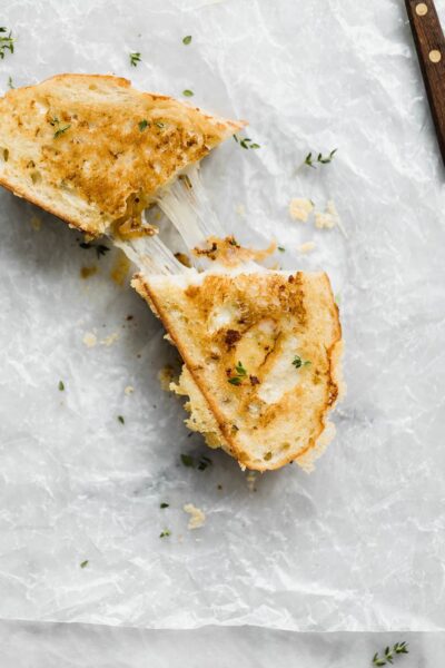 A Caramelized Onion, Whole Grain Mustard, and Gruyere Grilled Cheese perfect for spring. Just look at that gorgeous cheese pull!!!