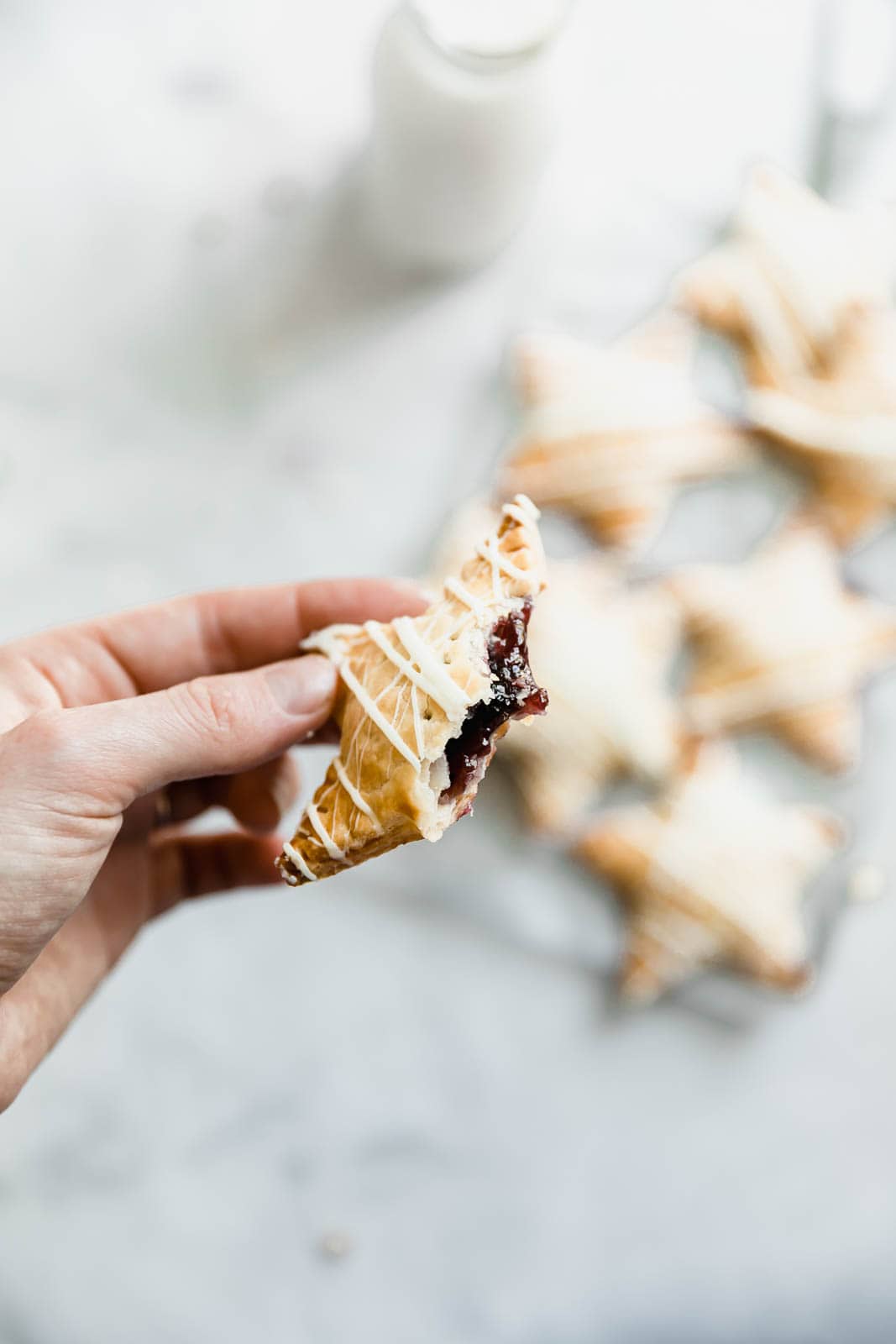 Sometimes, you just want pie. And some of those sometimes, you want pie that fits in your hand. Enter: these White Chocolate Blueberry Star Shaped Hand Pies