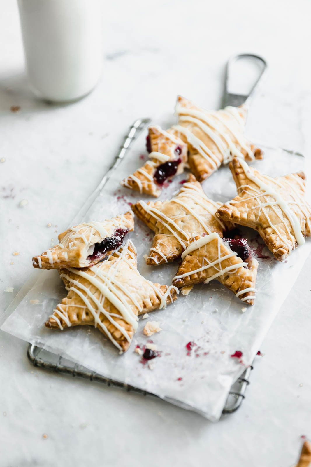 Sometimes, you just want pie. And some of those sometimes, you want pie that fits in your hand. Enter: these White Chocolate Blueberry Star Shaped Hand Pies