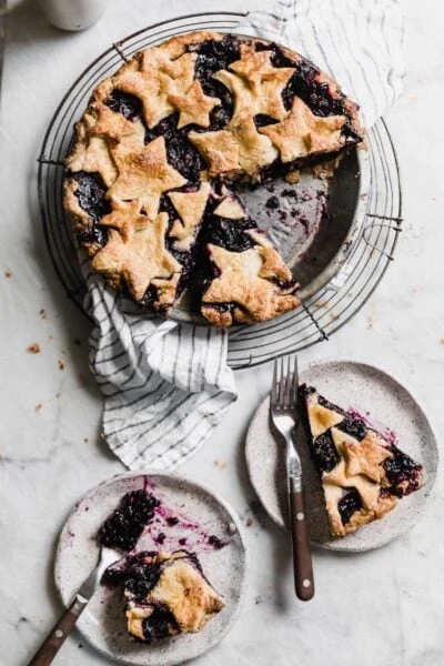 A delectable Fourth of July Blueberry Pie with a flakey pie crust perfect for your next summer get-together, barbecue, or picnic!