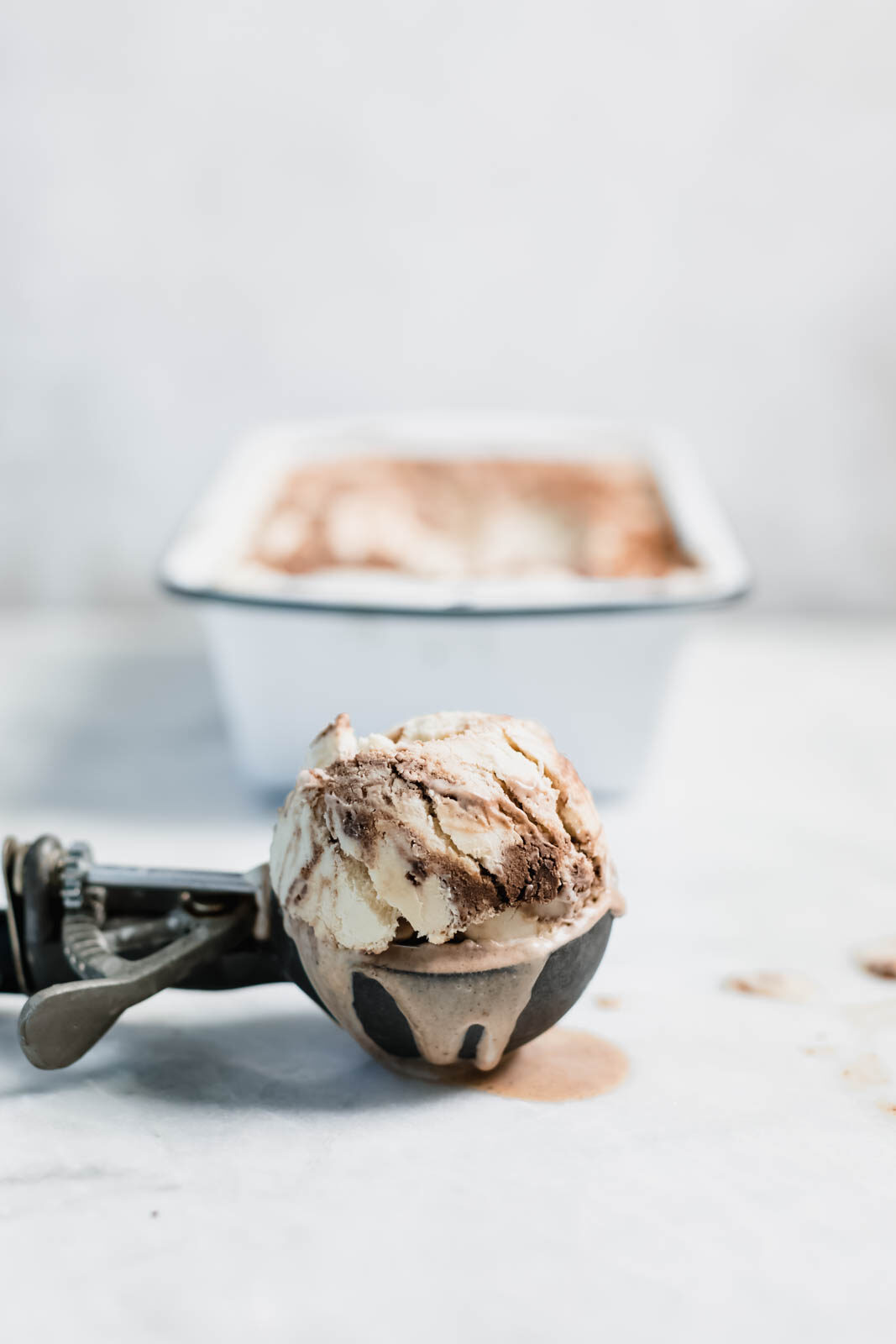 A creamy, dreamy vegan peanut butter ice cream made with coconut cream and swirled with chocolate ganache and graham crackers!