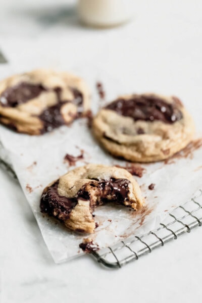 Giant chunks of dark chocolate and candied walnuts make for the most luxurious chewy Candied Walnut Chocolate Chip Cookies! Bonus: no stand mixer needed :)