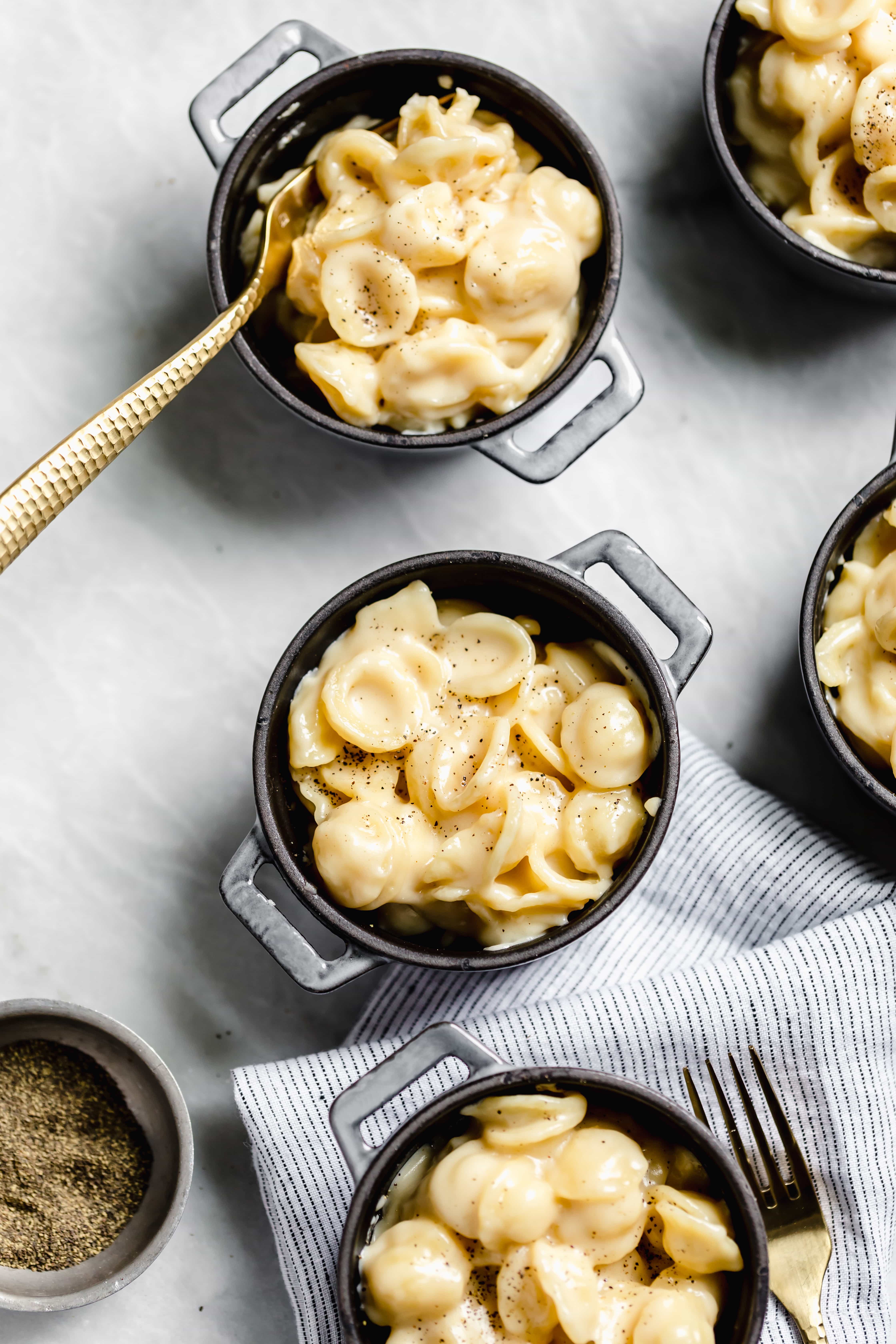 stovetop mac and cheese in bowls with forks