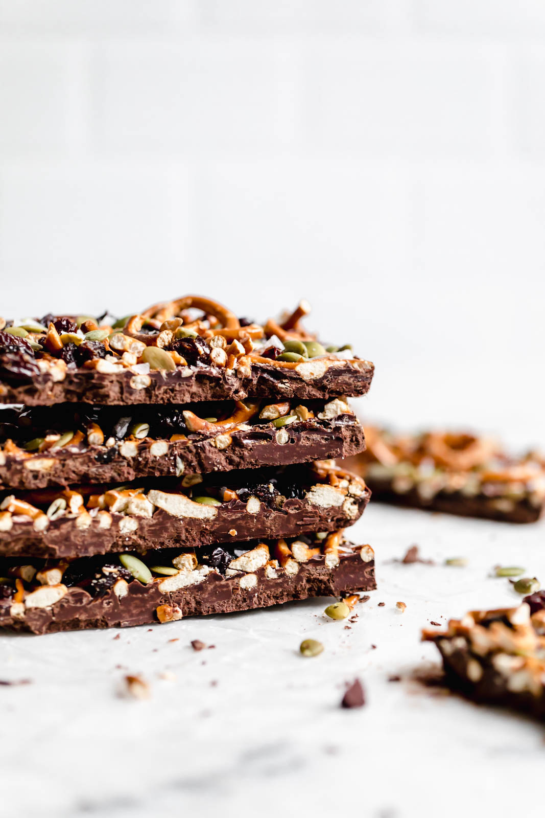 stack of sliced Dark Chocolate Bark with Pumpkin Seeds, Pretzels, and Dried Fruit