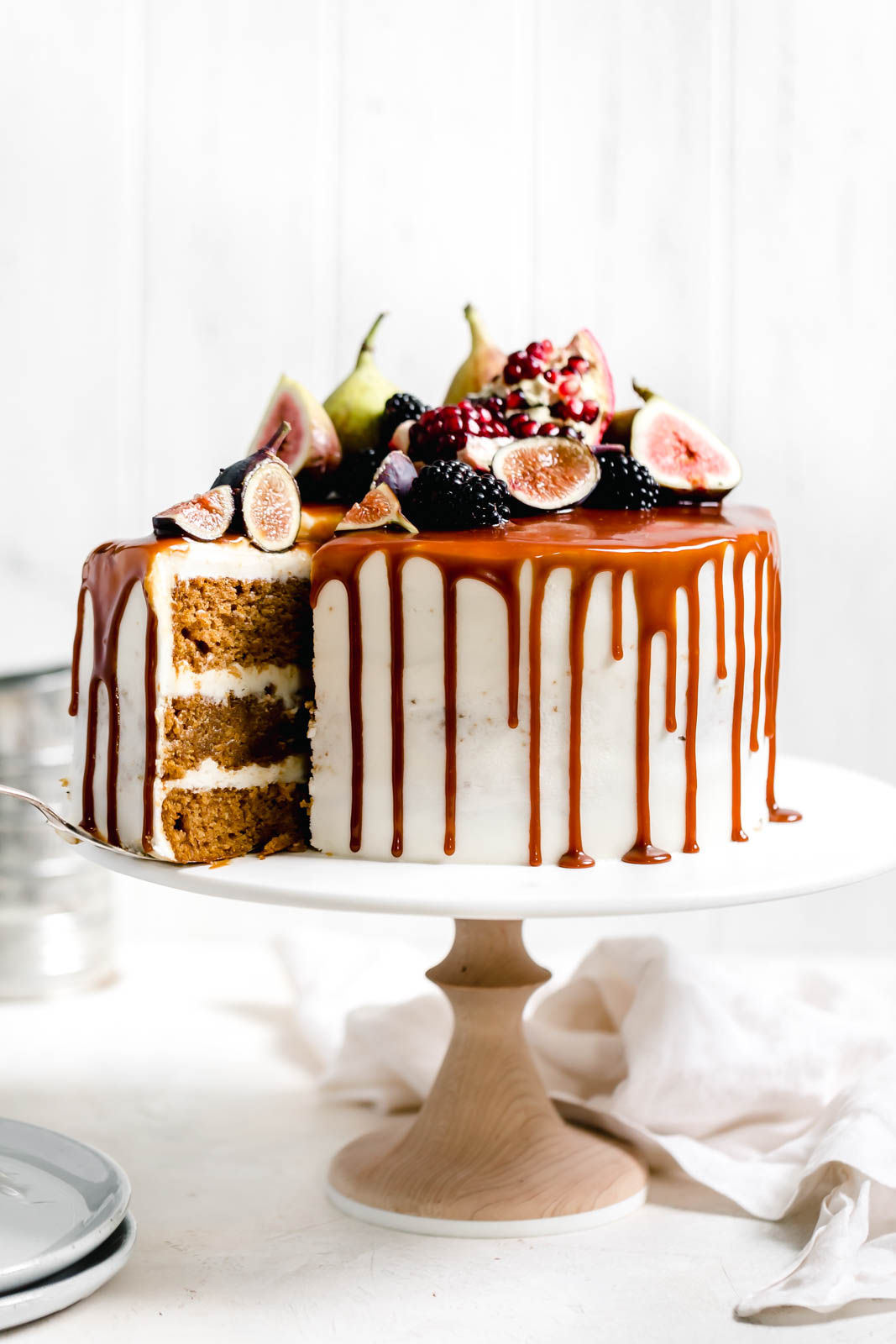 sliced Pumpkin cake on a cake stand