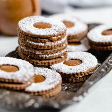 Gingerbread Linzer Cookies with Dulce De Leche Centers