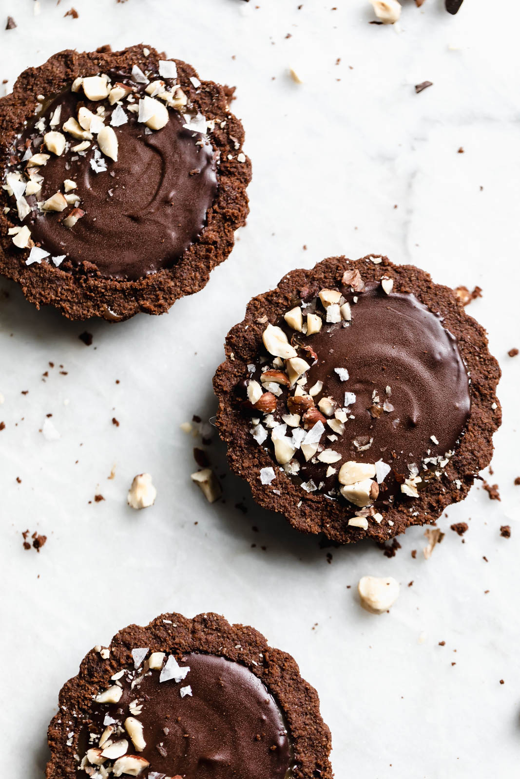 I’ve never met a tart I didn’t like, but these Salted Caramel Chocolate Tarts with a chocolate graham crust and toasted hazelnuts are on another level.